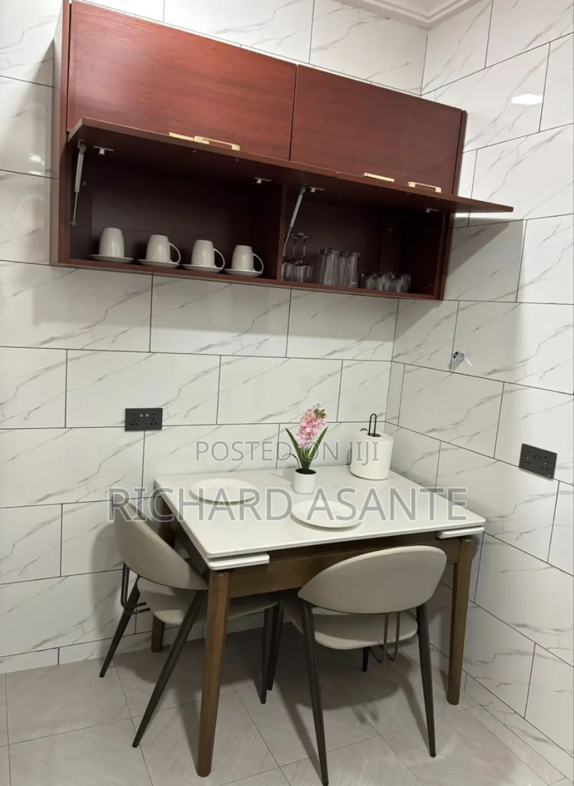 2 BDRM Vacation Apartment With Water Heater Kitchen at Kumasi Suame