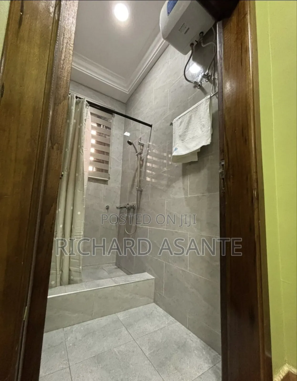 2 BDRM Vacation Apartment With Water Heater Kitchen at Kumasi Suame