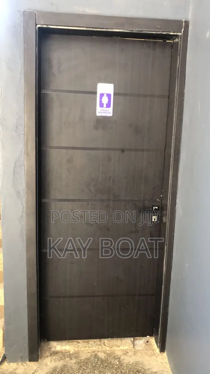 A Neatly Installed Fully Wooden Door
