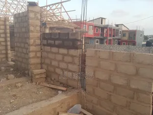 Fence Wall and Building Attached With 2 Stores