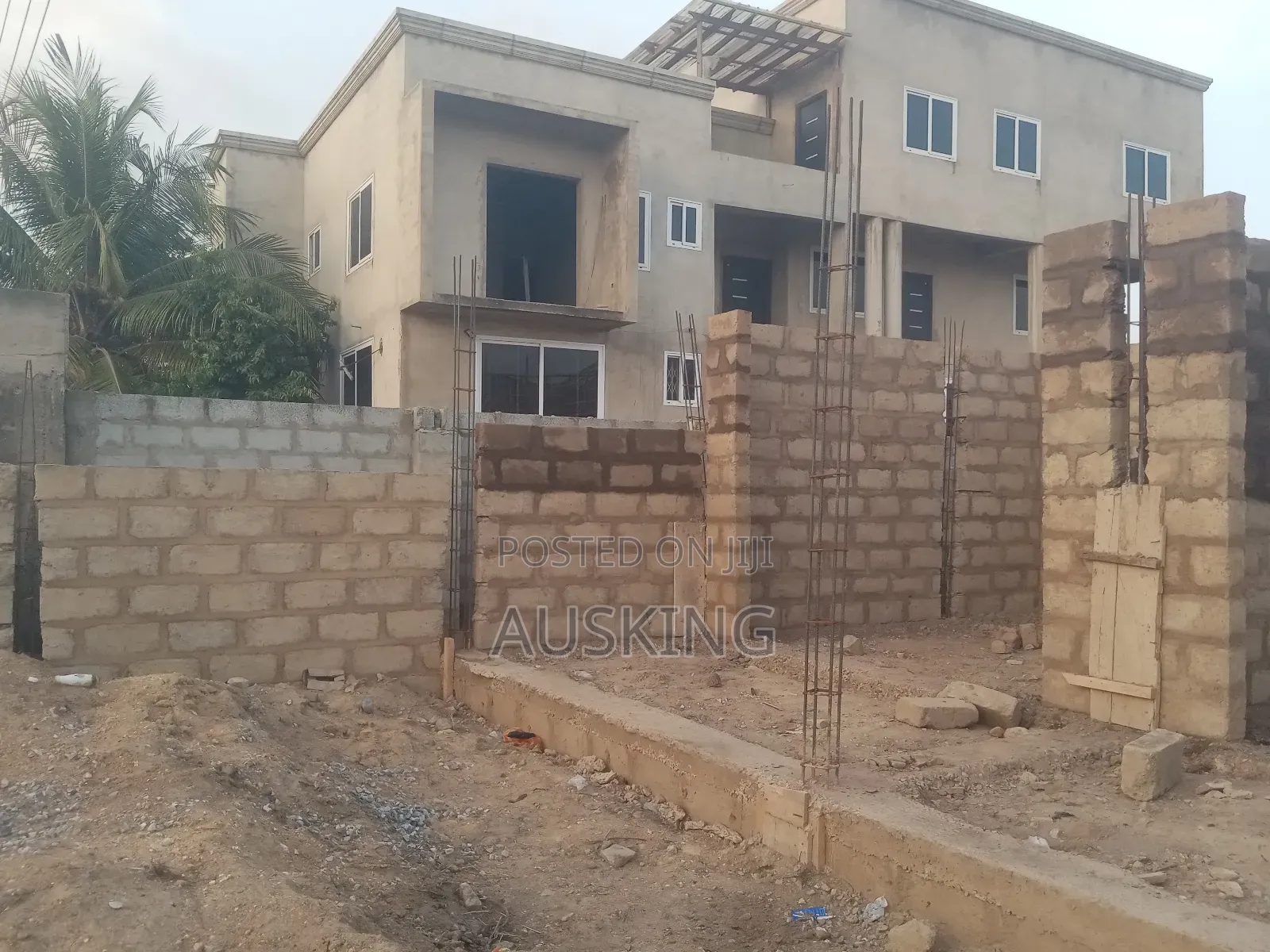 Fence Wall and Building Attached With 2 Stores