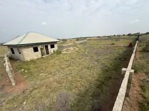 2 and Half Plots of Land With 2 Semi Completed Single Rooms ( Fenced )