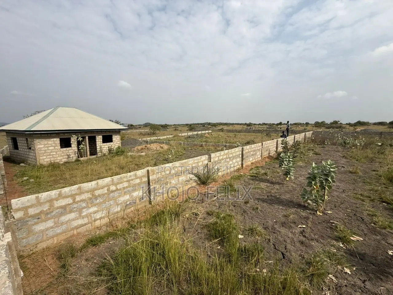 2 and Half Plots of Land With 2 Semi Completed Single Rooms ( Fenced )
