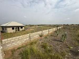 2 and Half Plots of Land With 2 Semi Completed Single Rooms ( Fenced )