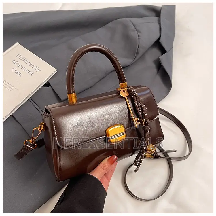 Elegant Black Mini Top-Handle Bag With Keychain