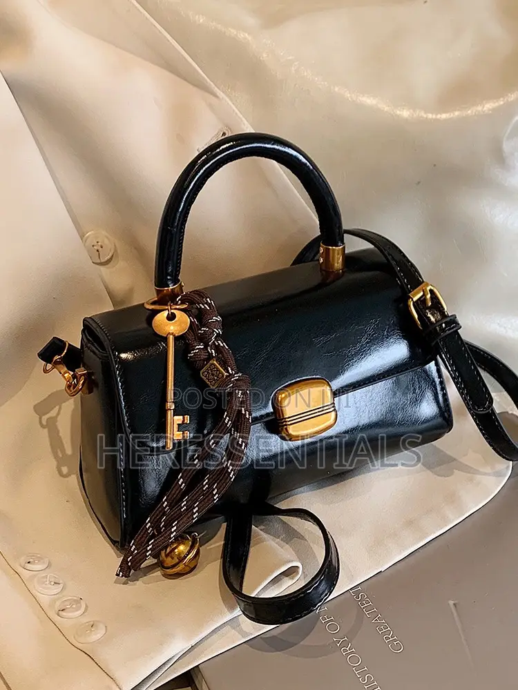 Elegant Black Mini Top-Handle Bag With Keychain