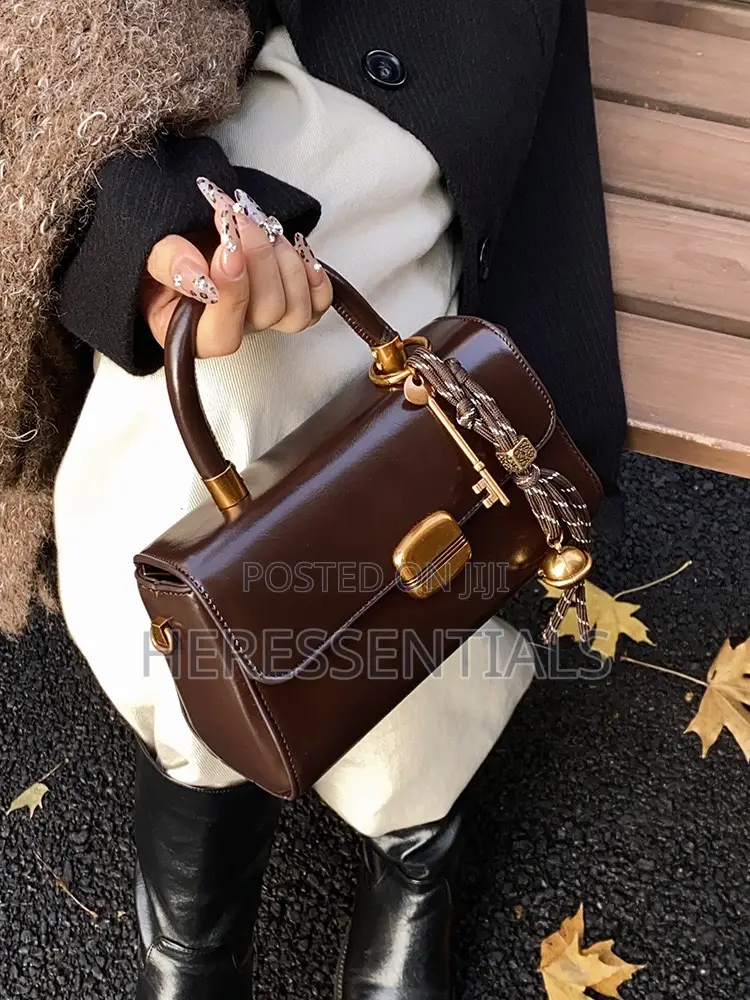 Elegant Black Mini Top-Handle Bag With Keychain