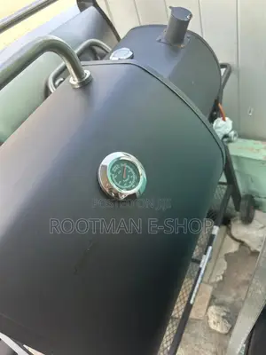 Double Charcoal Grill With An Offset Smoker