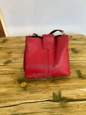 Red Pebbled Leather Drawstring Satchel