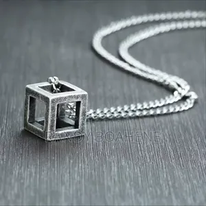 Retro Hollow Cube Pendant Necklace