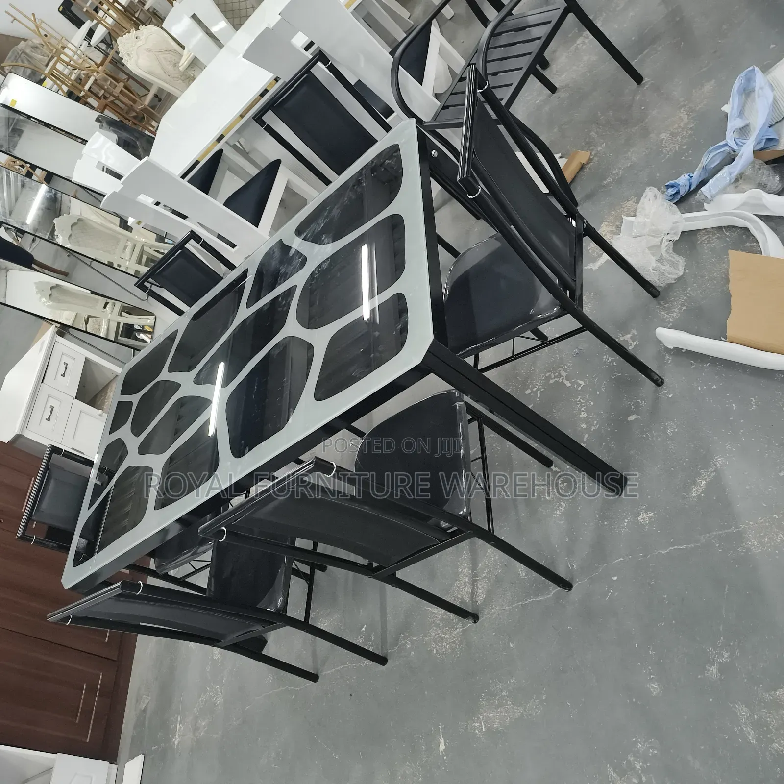 Modern Metal and Glass Dining Table Set With Six Black Chairs