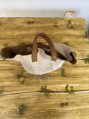 Minimalist Cream Pebbled Leather Tote With Tan Handles