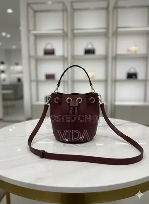 Deep Burgundy Pebbled Leather Bucket Bag With Drawstring