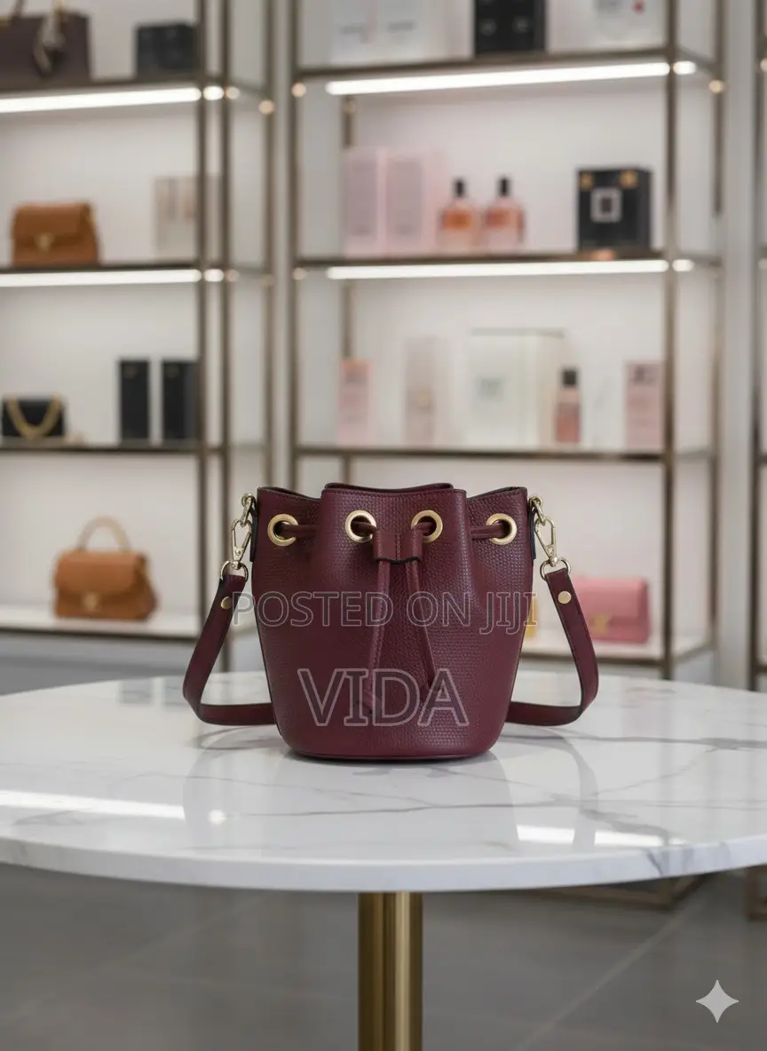 Deep Burgundy Pebbled Leather Bucket Bag With Drawstring
