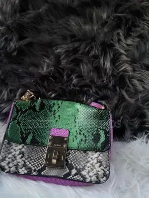 Aldo Colby Snake-Embossed Crossbody Bag.