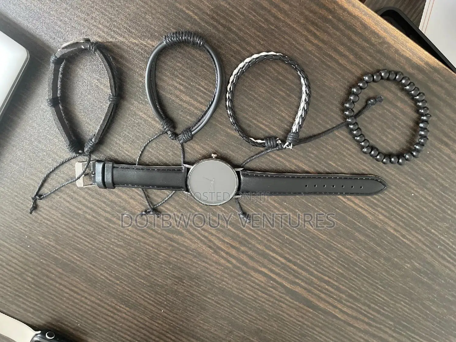 Black Wristwatch Of 4 Bracelet