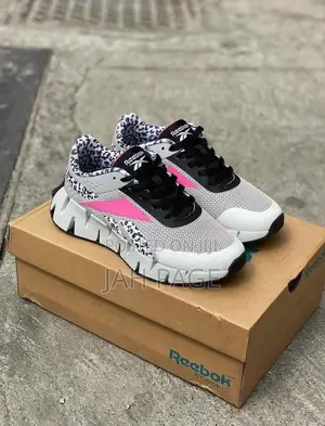 Ladies Wear Reebok Sneakers