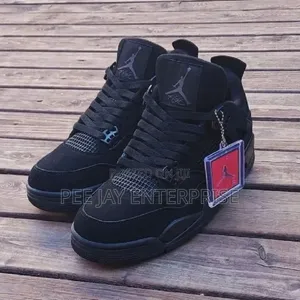 Air Jordan 4 Retro "Black Cat" Sneakers.