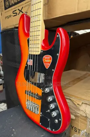 Fender Jazz Active Bass Guitar In A Sunburst Finish.