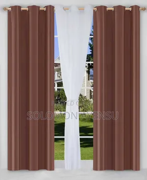 Quality Gold Sunblock Curtains and White Voile Sheer Curtains.