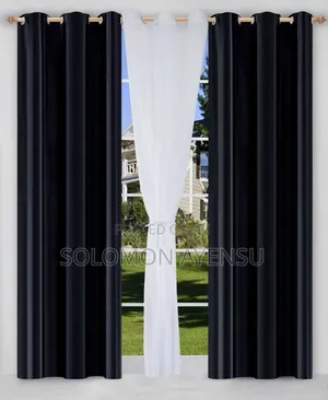 Quality Gold Sunblock Curtains and White Voile Sheer Curtains.