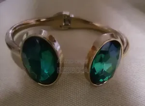 An Open Cuff Bangle Bracelet With Clear Crystal (Glass) Stones