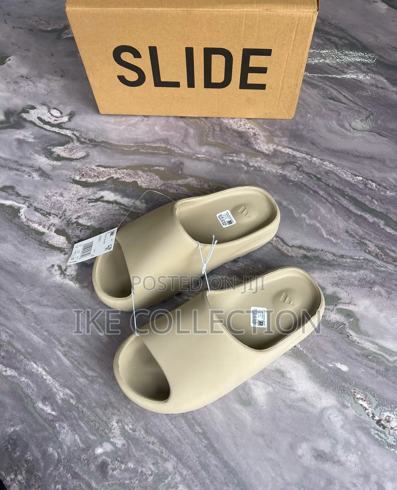 Solid Yeezy Slides in Box Available