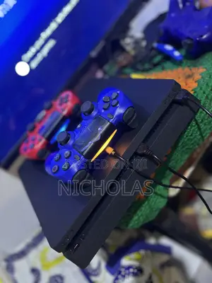 Ps4 Slim 1t,2gaming Pad and 6games Installed