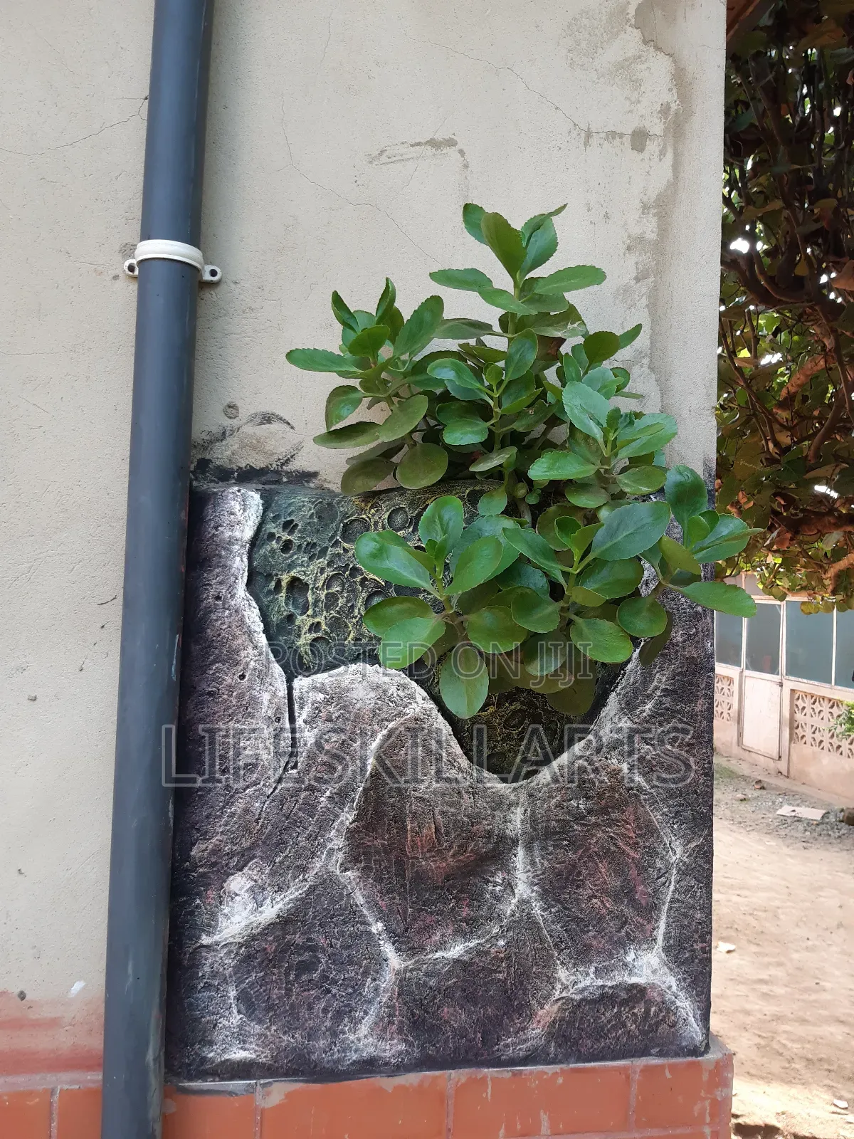 Decorated Flowerpot on Wall