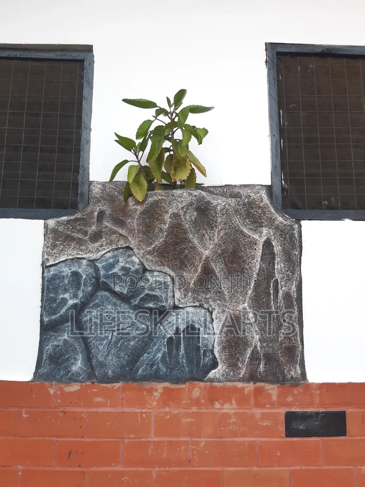 Decorated Flowerpot on Wall