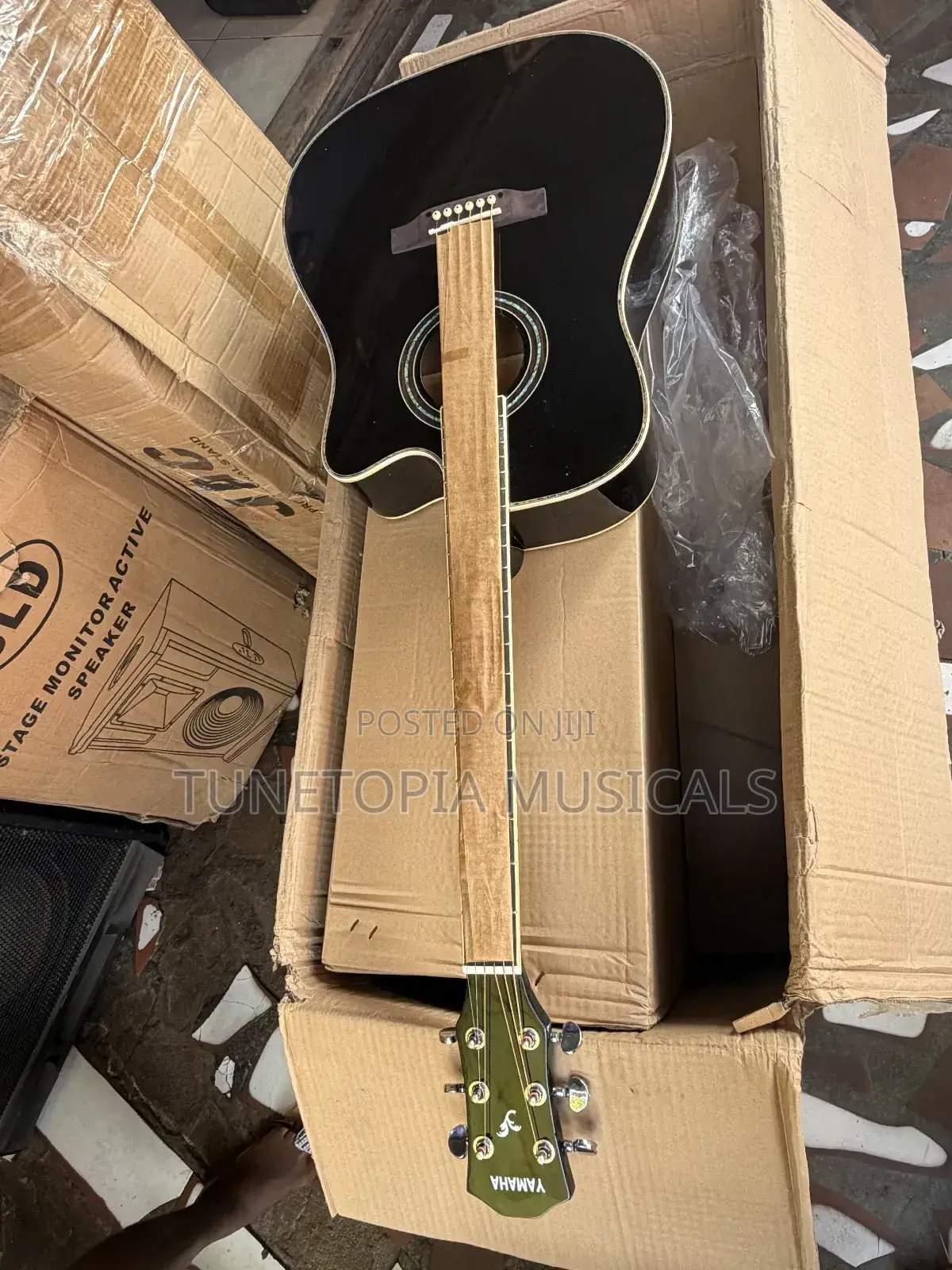 Yamaha Acoustic Guitar With A Cutaway Body Style.