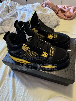 Nike Air Jordan 4 Retro Thunder Sneaker Available