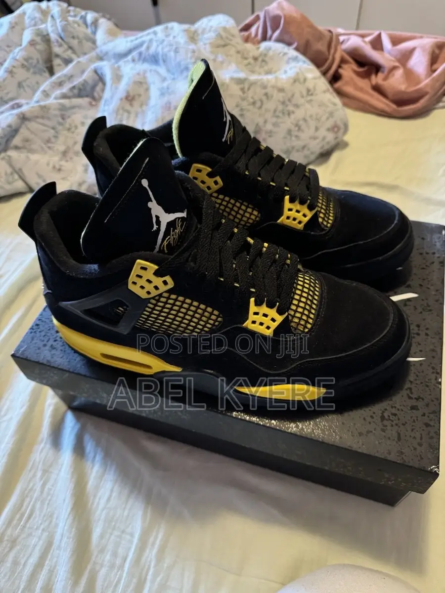 Nike Air Jordan 4 Retro Thunder Sneaker Available