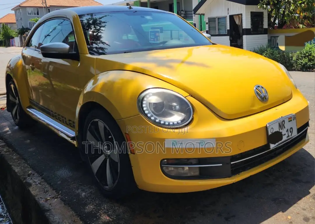 Volkswagen Beetle R-Line 2dr Hatchback (2.0L Turbo 4cyl 6AM) 2014
