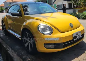 Volkswagen Beetle R-Line 2dr Hatchback (2.0L Turbo 4cyl 6AM) 2014