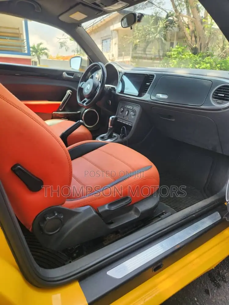 Volkswagen Beetle R-Line 2dr Hatchback (2.0L Turbo 4cyl 6AM) 2014