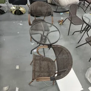 Brown Plastic Wicker Patio Dining Set.