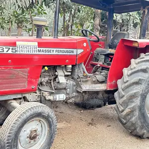 Mf 375 Tractor With Plough