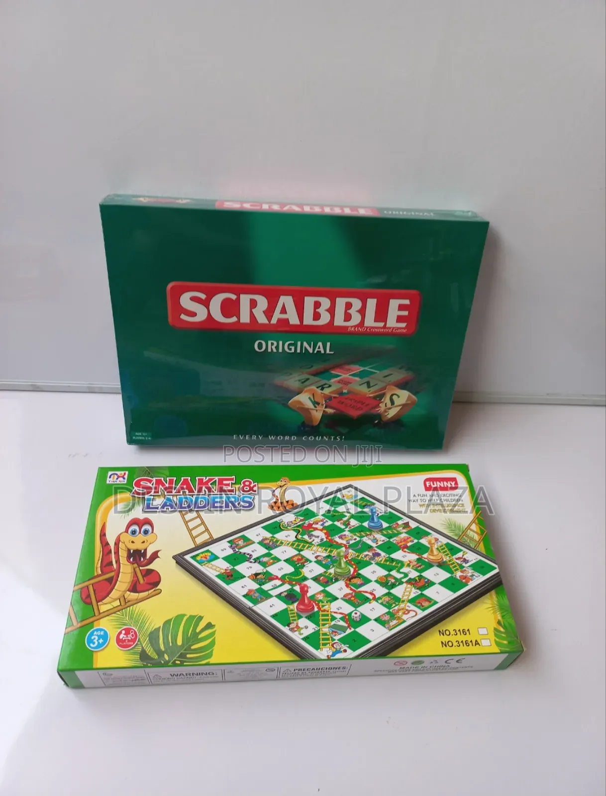 Scrabble + Snake and Ladders