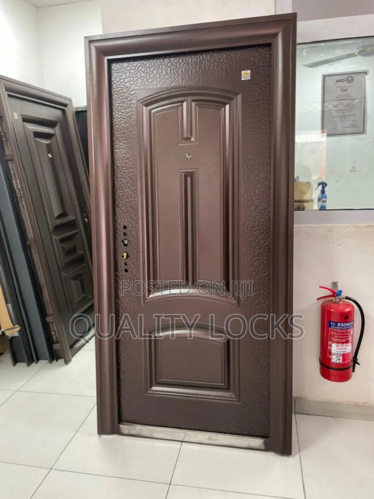 Quality Locks Outside Open Metal Door