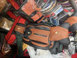 Complete Brown and Black Leather Seat Covers With Pillows