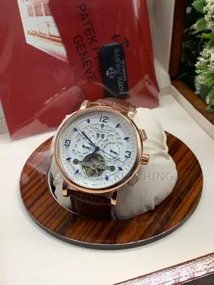 Patek Philippe Brown Leather Automatic Watch With White Surface
