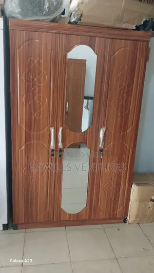 Brown Three-Door Wooden Wardrobe With Two Mirror