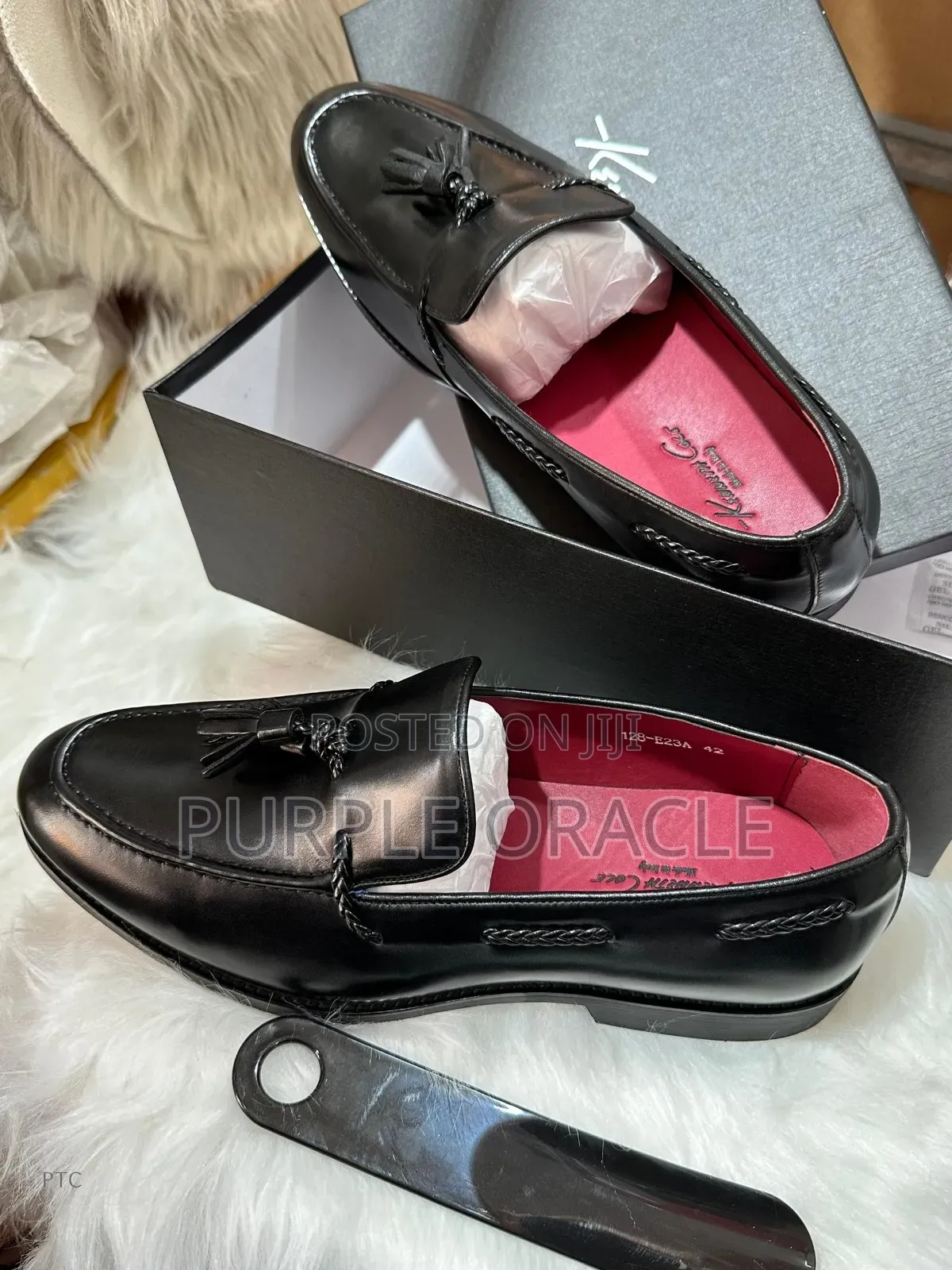 Kenneth Cole Black Leather Tassel Loafers.