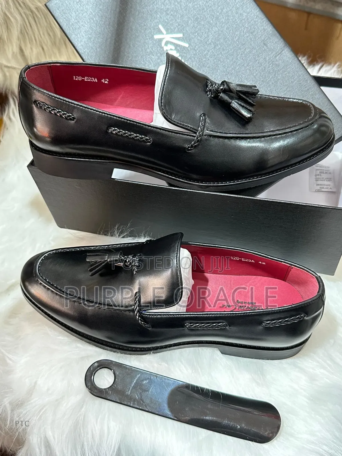 Kenneth Cole Black Leather Tassel Loafers.