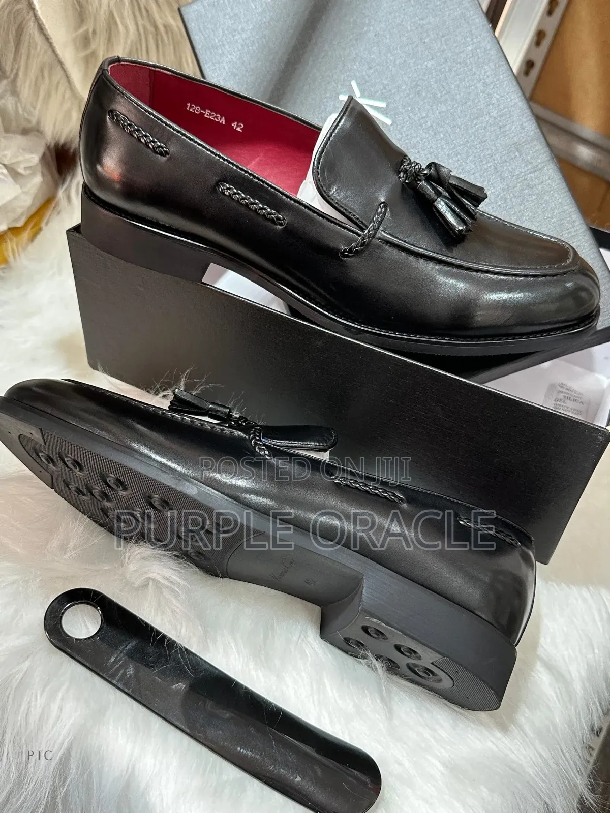 Kenneth Cole Black Leather Tassel Loafers.