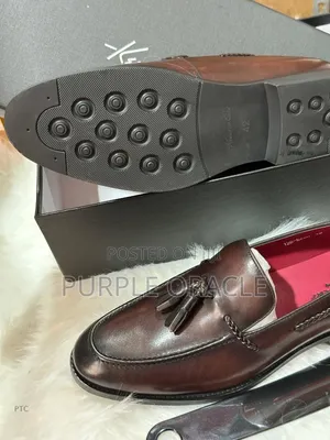 Kenneth Cole Brown Leather Tassel Loafers.