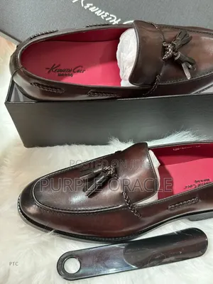 Kenneth Cole Brown Leather Tassel Loafers.
