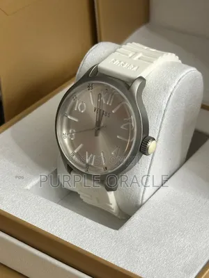 Versus Versace City Watch In A Silver Case And White Rubber Strap.