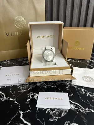 Versus Versace City Watch In A Silver Case And White Rubber Strap.